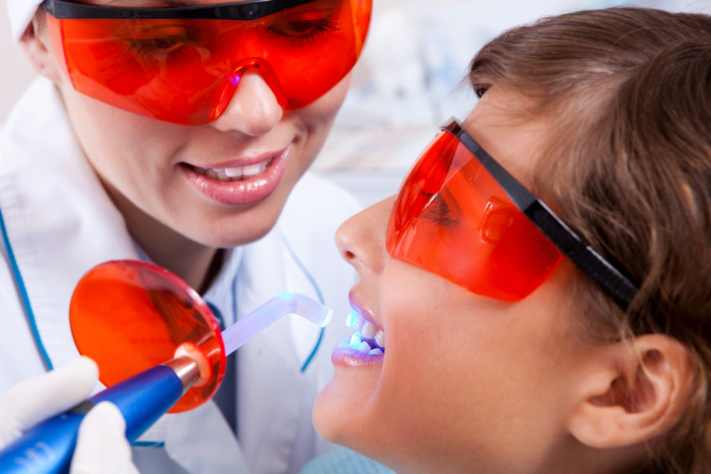 In office teeth whitening or at home teeth whitening